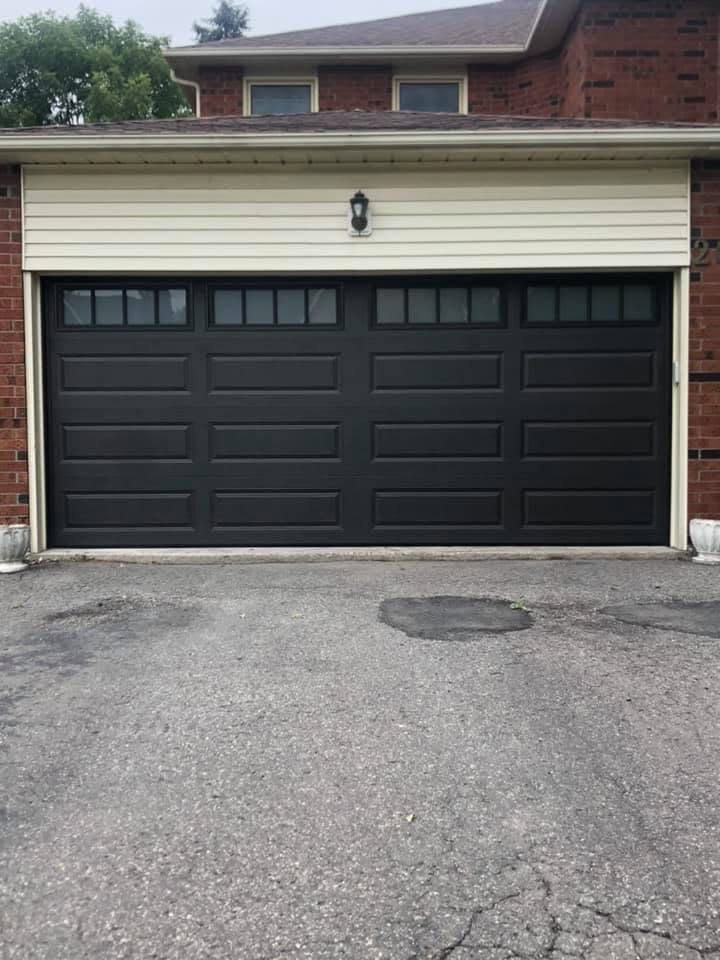 Black garage door after replacement